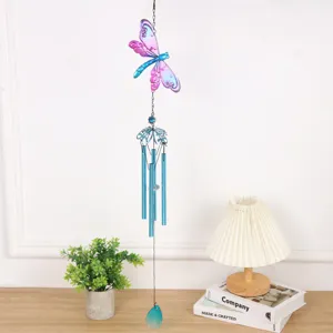 Exquisite metal dragonfly wind chime with painted glass design, perfect hanging home decor.