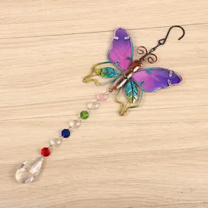 Detailed view of colorful butterfly crystal suncatcher pendant with sparkling hanging prism beads.