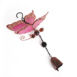 Luminous butterfly wind chime ornament with pink acrylic wings and metal bell details.