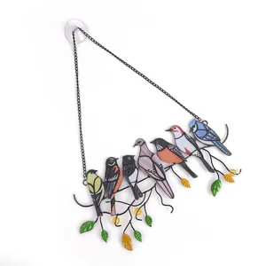 Stained glass metal bird hanging decoration, colorful flock of birds window suncatcher.
