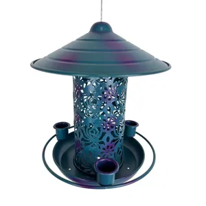 Metal hanging bird feeder with teal finish and decorative cutout scroll design for garden.