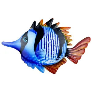 Metal tropical fish wall art detail, vibrant blue and red metal hanging decor, outdoor.