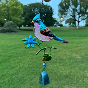 Metal stained glass bird wind chime detail, colorful hanging ornament for courtyard balcony.