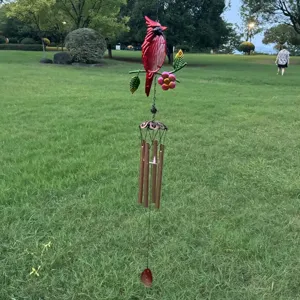 Hanging cardinal wind chime with glass and metal tubes for garden, patio, and outdoor decor.
