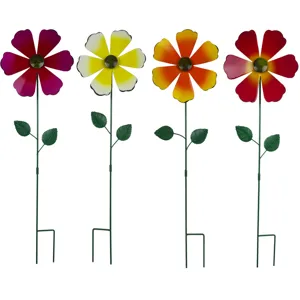 Colorful metal garden stakes with flowers, perfect for outdoor lawn and yard decor details.