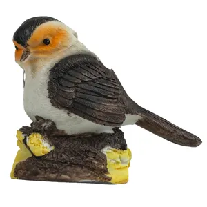 Detail view of the resin little bird garden solar light ornament, ideal for outdoor lawn decoration.