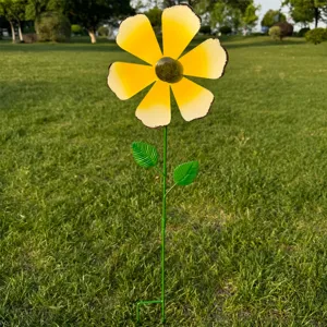 Detail view of the metal garden flower stake featuring yellow petals for outdoor lawn decor.
