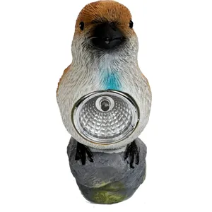 Detailed view of the cute bird solar garden light resin ornament for outdoor yard decor.