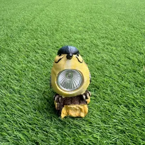 Close-up detail of the cute bird solar garden light showcasing the bright LED lamp beads and texture.