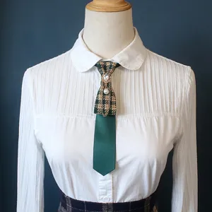 College style pre-tied tie vintage plaid bow tie with rhinestones and pearls accessory.