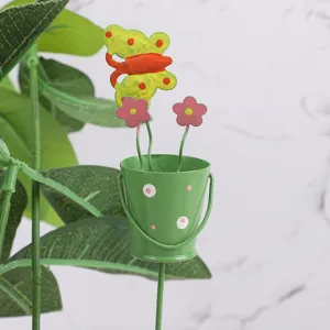 Metal garden stake detail, cute butterfly flower insert for plants and landscape.