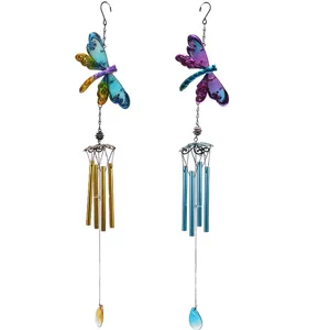 Dragonfly metal wind chime detail showing colorful stained glass wings and tuned tubes.
