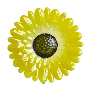 Metal sunflower garden stake closeup, vibrant yellow iron flower art decor for yard lawn landscape.