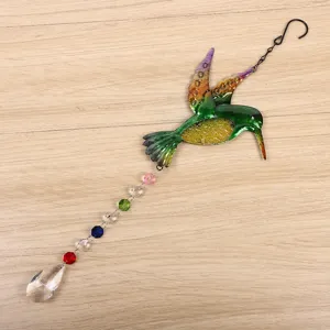 Hummingbird crystal wind chime pendant detail, rainbow suncatcher hanging ornament.