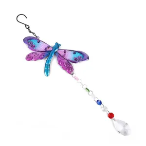 Exquisite dragonfly suncatcher detail with sparkling crystals and vibrant metal wings for home decor.