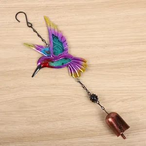 Metal hummingbird wind chime detail shot, colorful glass painted garden hanging ornament.