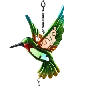 Close-up detail of the metal and painted glass hummingbird wind chime pendant garden decor.