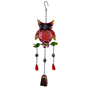 Close-up detail of the colorful metal and glass owl wind chime hanging decor for garden.