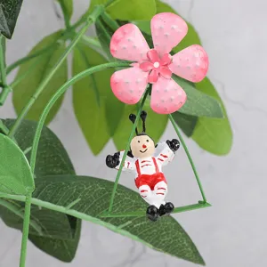 Metal garden flower insert decoration, cute swinging bug design, perfect for potted plants.