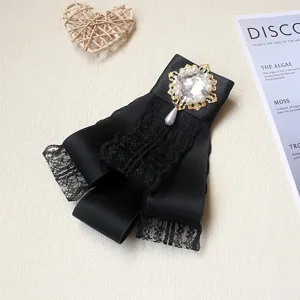Elegante spilla con fiocco in pizzo nero e strass perle vintage per elegante moda donna.