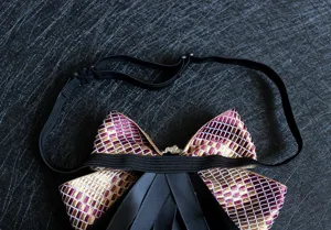 Detailed rear view of British style men's bow tie with adjustable strap and ribbons.