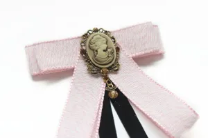 Academy style pink bow tie brooch with vintage cameo portrait pendant for women uniform.