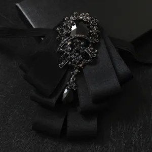 Elegant black multi-layered ribbon bow tie brooch with sparkling crystals for men suits.
