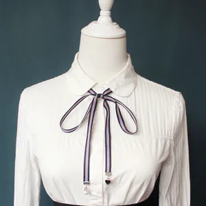 Elegant women's striped ribbon bow tie with pearl charm, perfect for preppy style shirts.