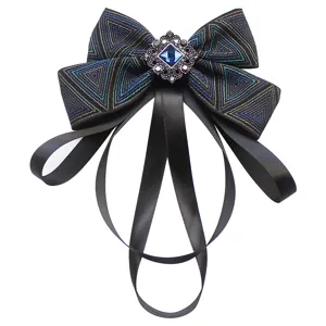 Elegant British style men's bow tie with blue crystal brooch and hanging black satin ribbons.