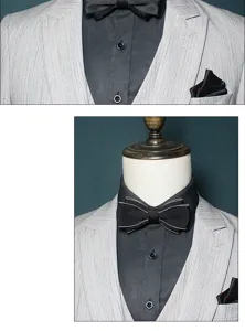 Men's formal suit detail bow tie set with black shirt and elegant necktie for business wear.