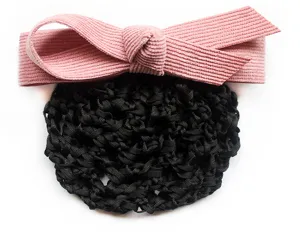 Detailed close-up of the delicate pink corduroy bow and professional black hair net bun cover.
