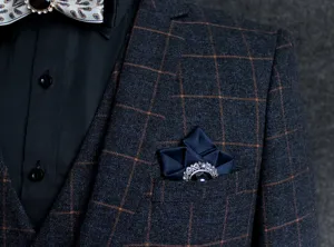 Exquisite men's suit brooch and collar pin set, featuring vintage crystal design for formal wear.