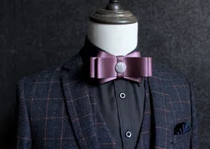 Elegant men's formal bow tie for weddings and business suits, premium satin fabric texture.