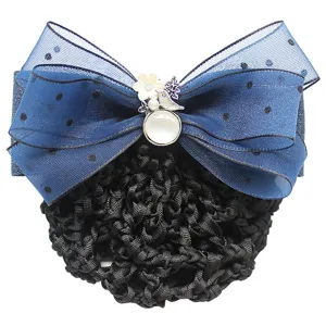 Professional hair net bow clip with dark blue polka dot mesh and elegant floral charm decoration.