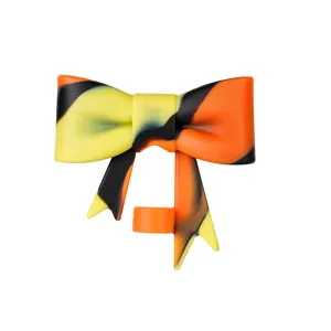 Silicone bow straw topper detail shot, colorful tie-dye design, secure fit for cups.