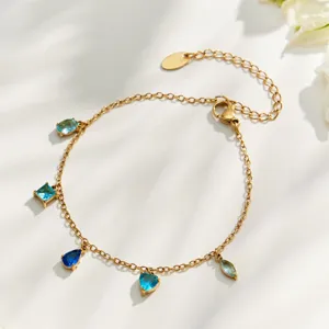 Gold-plated chain bracelet featuring colorful cubic zirconia drop charms and fine detail design.