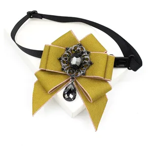 Detailed view of the vintage style children ribbon bow tie with sparkling dark rhinestones.