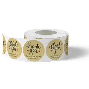 Rouleau d'autocollants ronds en papier kraft merci pour emballage et scellement de cadeaux.