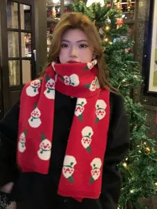 Christmas red knit scarf featuring cute snowman pattern, soft and warm winter neckerchief accessory.