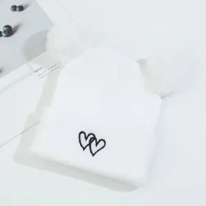 Cute baby knit hat with double pom poms and heart embroidery warm winter beanie cap main