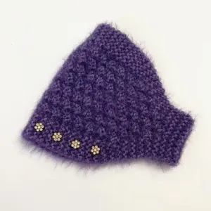 Detail shot of the purple thick knitted winter ear warmer headband with rhinestone flower buttons.