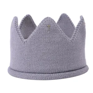 Grey knitted baby crown headband, soft wool infant hair accessory for cute photography.