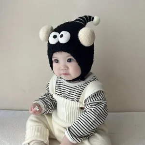 Cute baby winter warm plush hat with funny big eyes novelty cartoon earflap design for kids.