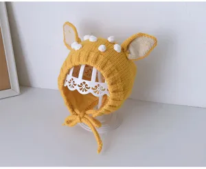 Niedliche Baby Strickmütze mit Ohren und Bommeln, warme Wintermütze mit Ohrenklappen.
