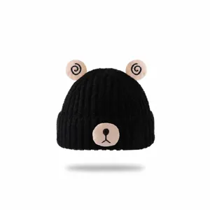 Cute knitted bear ear beanie hat detail view, soft warm winter baby cap feature display.