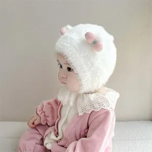 Schattige baby winter dikke pluche warme muts met roze strikjes, zacht oorklep ontwerp.