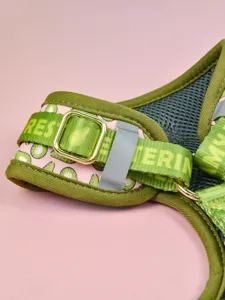 Cute avocado print pet harness detail shot with breathable mesh and sturdy metal hardware.