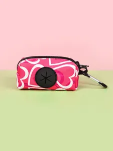 Cute pink heart pattern pet waste bag holder with carabiner hook for daily dog walking.