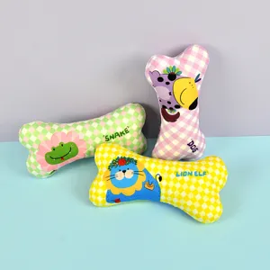 Cute cartoon bone shaped dog chew toy set, soft plush pet teething toys for fun playing.
