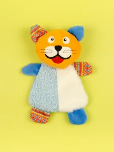 Detailed view of colorful plush pet toy with mixed textures and geometric pattern limbs.